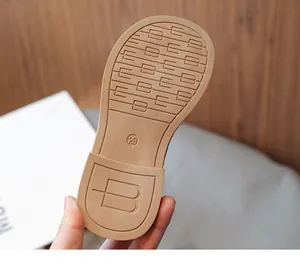 Detailed macro view of non-slip rubber sole for girls roman princess leather shoes
