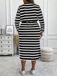 Back view of plus size casual black and white striped long sleeve drawstring dress