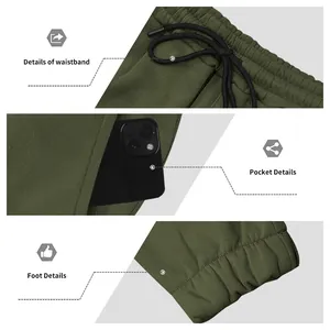 Detailopnames van de tailleband, zakken en elastische boorden van de heren cargo broek.