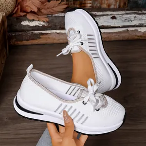 Close-up of lightweight breathable slip-on knitted walking shoes for women
