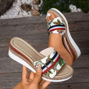 Stylish floral embroidered platform wedge sandals with decorative striped straps
