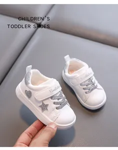 White toddler sneakers with silver glitter star and heart details for boys and girls