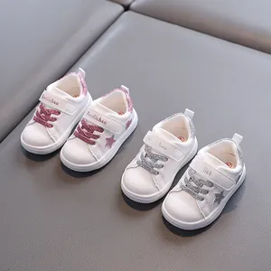 White toddler star sneakers made of microfiber leather with anti-slip glitter design