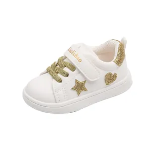White waterproof micro-fiber leather toddler shoes with gold glitter star and heart patterns