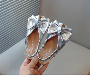 Stylish silver bow clogs for girls, metallic princess slippers detail view for summer 2025
