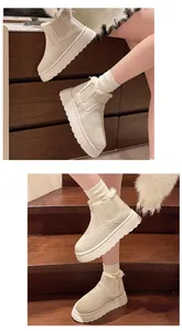 Detail view of stylish beige platform snow boots featuring a warm plush lining for winter