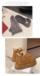 Side view detail of warm brown platform snow boots with plush lining and elastic side