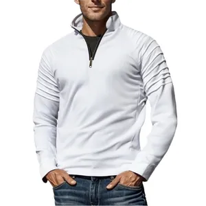 Detailed view of white men's quarter-zip sports sweatshirt with pleated shoulder design.