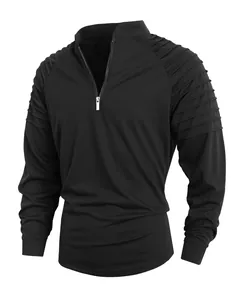 Detail view of men's black sports sweatshirt with ribbed shoulders and half-zipper