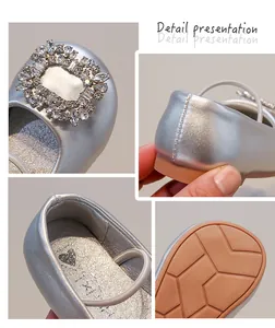 Detailed views of silver baby girl flats featuring crystal buckle and flexible sole