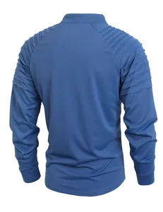 Rear view of blue athletic long-sleeve shirt showing textured shoulder pleated details.