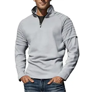 Detailed view of grey men's slim fit quarter-zip sweatshirt with pleated shoulder detail