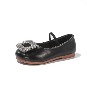 Elegant black soft leather girls' Mary Jane shoe with sparkly rhinestone buckle