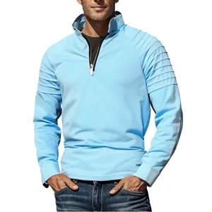 Detail of light blue men's quarter-zip sports sweatshirt with ribbed sleeve patterns