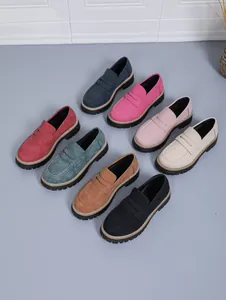 Multiple colors of women's chunky heel loafers with thick lug soles and penny straps