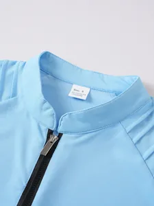 Detailed view of light blue men's sport sweatshirt featuring a zipper and stand collar