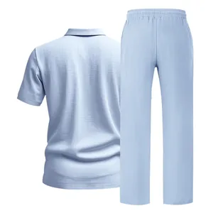 Back view detail of light blue men's linen short sleeve shirt and elastic waist pants set