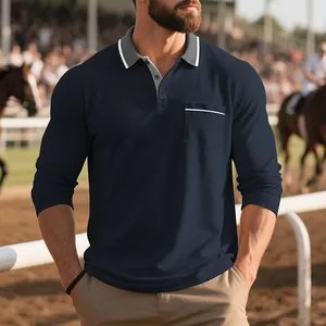 Dettaglio polo a maniche lunghe blu navy con tasca e design del colletto a contrasto