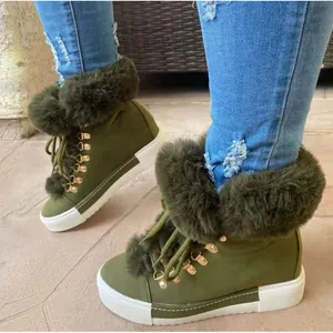 Olive green women's winter snow boots with plush faux fur trim and white platform soles