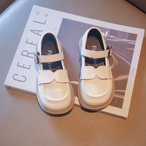 Elegant girl's cream leather Mary Jane shoes featuring thick soles and stylish buckle straps