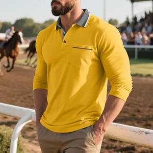 Vista dettagliata di una polo gialla a maniche lunghe da uomo con tasca e colletto a contrasto.