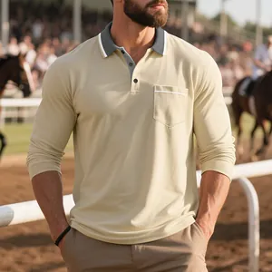 Primo piano della polo beige a maniche lunghe con colletto a contrasto e taschino frontale