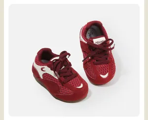 Dark red infant toddler sneakers with breathable mesh panels and suede finish laces
