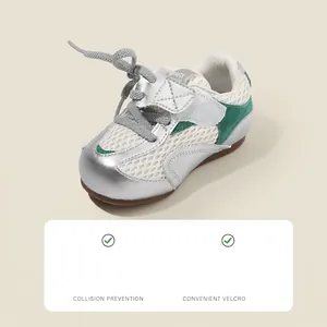 Silver and green mesh toddler walking shoes with adjustable velcro strap closure