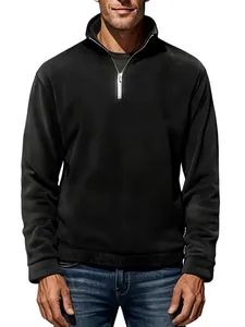 Detailed view of men's black half-zip fleece sweatshirt featuring a stand collar design