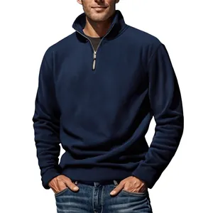 Detail view of navy blue men's fleece pullover with 1/4 zip and stand-up collar