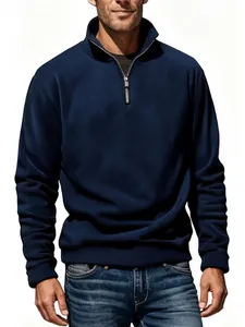 Detailed view of a navy blue men's half-zip fleece pullover with a premium stand collar