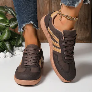 Casual brown sneakers with three-stripe design and anti-slip rubber sole for women