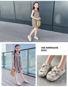 Detailansicht von beigen Prinzessinnen-Schuhen für Mädchen mit eleganten Doppelschleifen