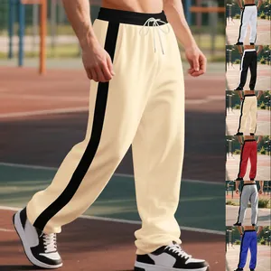 Detail view of men's loose wide-leg sweatpants showing various color options