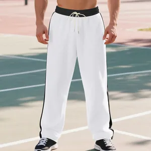 Men's loose white sweatpants with black side stripes for athletic or casual outdoor wear