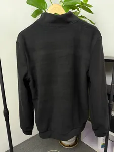 Back view of a black men's fleece sweatshirt with a mock neck and ribbed cuffs