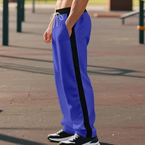 Men's heavy fleece blue straight leg joggers featuring a black side stripe and drawstring