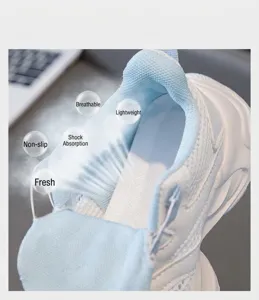 Detail view showing breathable mesh lining in girls' white and blue sports sneakers
