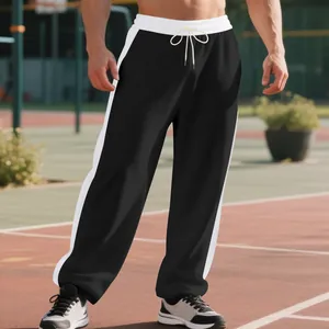 Men's heavy terry sweatpants with contrast white side stripes and drawstring waist.