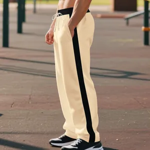 Premium men's heavyweight cream sweatpants featuring a stylish black side stripe detail
