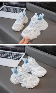 Close-up of white and blue girls' breathable mesh sneakers with rotary buckle system.