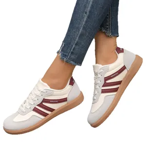 Casual white and burgundy women's German army trainer sneakers with anti-slip rubber sole