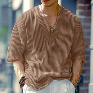 Detail view of the vertical ribbed knit texture on a brown casual V-neck men's shirt.