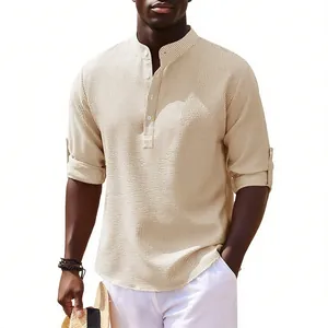 Detailed view of men's beige mandarin collar shirt with waffle texture and buttons