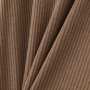 Close-up macro view of high-elasticity coffee-colored ribbed knit fabric texture