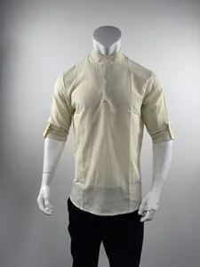 Detailed close-up of men's mandarin collar seersucker striped shirt in light yellow