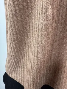 Detailed macro view showing the high-quality ribbed knit texture of the tan summer top.