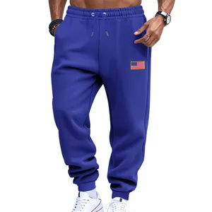 Men's blue American style joggers with flag patch detail and comfortable drawstring waist