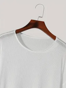Detailed view of white round neck dropped shoulder long sleeve thin ribbed loose top