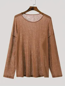 Detailed view of brown ribbed long sleeve T-shirt with breathable thin fabric texture.